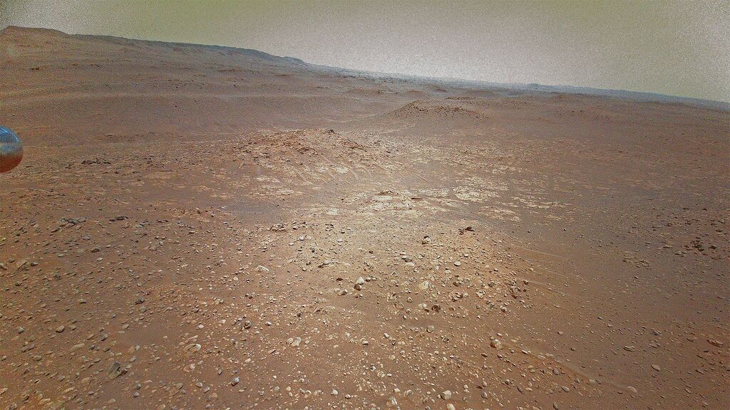 Red and beige rocky surface of Mars through the eyes of ingenuity