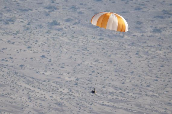 OSIRIS-REx Sample Return training showing the sample landing safely with a parachute
